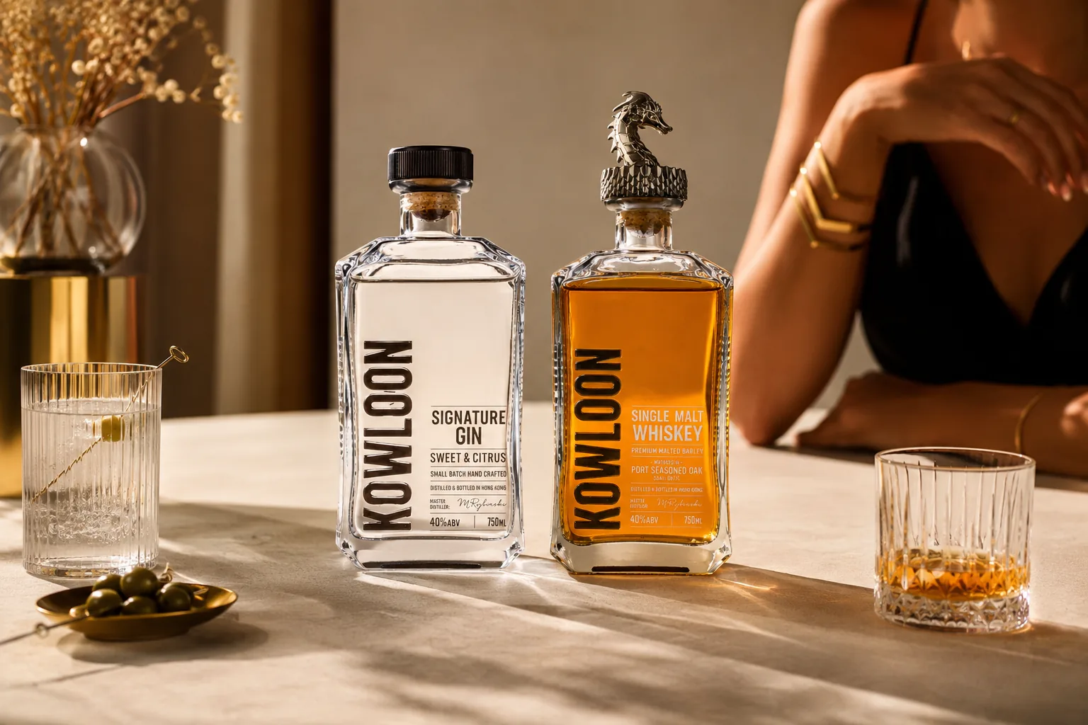 Kowloon Signature Gin and Single Malt Whiskey on a sunlit table